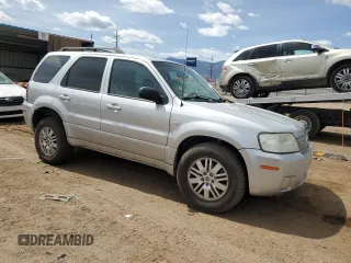 2007 Mercury Mariner Luxury z VIN 4M2YU91117KJ02032, wystawiony jako Copart lot #50418815 z przebiegiem 128 498 mil mil oraz Szkoda całkowita • Salvage title. Historia ofert i sprzedaży dostępna na DreamBid. Obrazek 4.