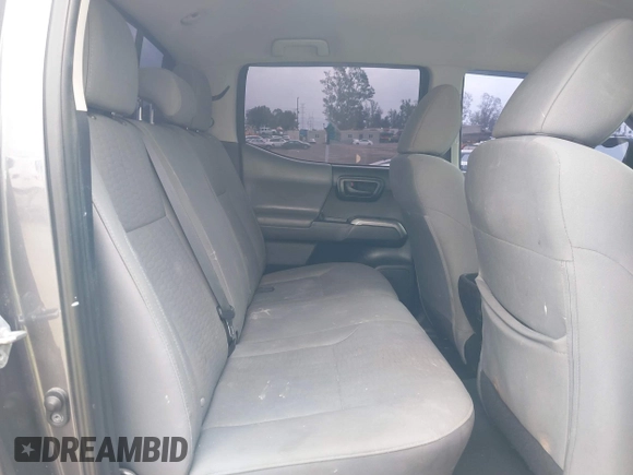 2018 Toyota Tacoma SR5 with VIN 5TFAZ5CNXJX066952, listed as a IAAI auction lot 41894562 with 141,818 mi miles and . Bid and sale history available at DreamBid. Image 8.