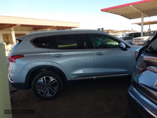 2019 Hyundai Santa Fe Limited with VIN 5NMS53AA8KH077883, listed as a IAAI auction lot 41884106 with 61,232 mi miles. Bid and sale history available at carsss.com. Image 13.