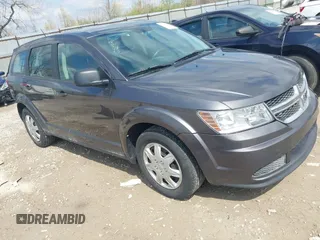 2014 Dodge Journey SE with VIN 3C4PDCAB1ET219760, listed as a IAAI auction lot 42013441 with 106,212 mi miles and . Bid and sale history available at carsss.com. Image 1.