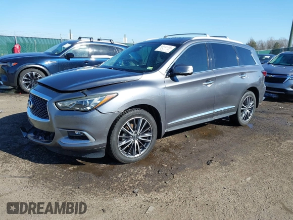 2016 Infiniti QX60 with VIN 5N1AL0MM5GC502404, listed as a IAAI auction lot 41347240 with 133,334 mi miles and . Bid and sale history available at DreamBid. Image 2.