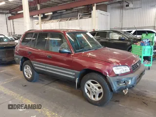 1998 Toyota RAV4 with VIN JT3GP10V8W7041024, listed as a IAAI auction lot 42454542 with 212,043 mi miles and . Bid and sale history available at DreamBid. Image 1.