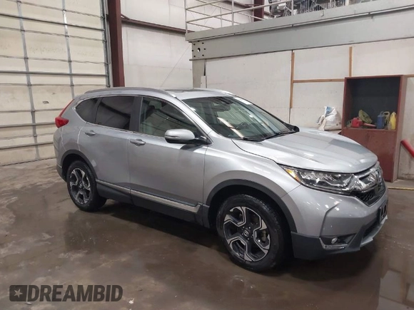 2017 Honda CR-V Touring with VIN 2HKRW2H90HH603307, listed as a IAAI auction lot 41868564 with 81,144 mi miles. Bid and sale history available at carsss.com. Image 1.