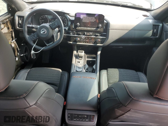2024 Nissan Pathfinder Rock Creek with VIN 5N1DR3BD6RC274142, listed as a Copart auction lot 59990055 with 9,921 mi miles and Salvage title. Bid and sale history available at DreamBid. Image 8.