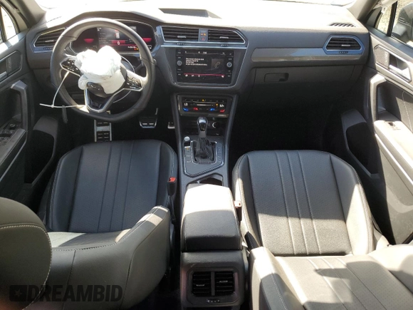 2023 Volkswagen Tiguan SE R-Line Black with VIN 3VVCB7AX6PM001044, listed as a Copart auction lot 47365565 with 20,059 mi miles and Salvage title. Bid and sale history available at DreamBid. Image 8.