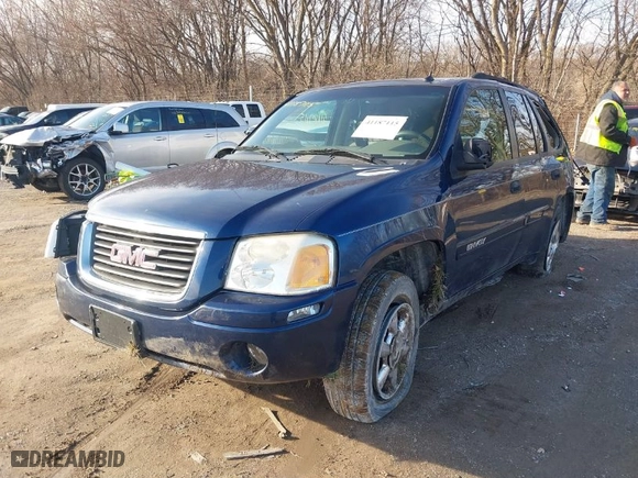 2004 GMC Envoy SLE with VIN 1GKDS13S842152119, listed as a IAAI auction lot 41187115 with 194,304 mi miles. Bid and sale history available at carsss.com. Image 2.