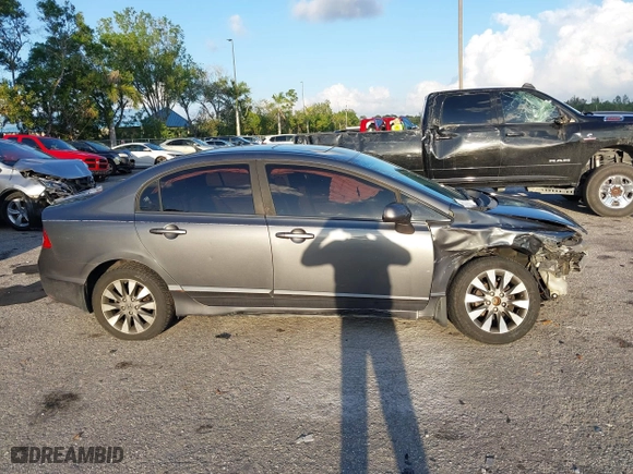 2010 Honda Civic Sdn EX with VIN 19XFA1F80AE026715, listed as a IAAI auction lot 41887154 with 128,272 mi miles. Bid and sale history available at carsss.com. Image 13.