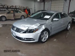 2015 Volkswagen CC R-Line z VIN WVWBP7AN9FE826400, wystawiony jako IAAI lot #40931896 z przebiegiem 117 022 mil mil oraz . Historia ofert i sprzedaży dostępna na DreamBid. Obrazek 2.