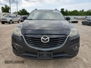 2015 Mazda CX-9 Grand Touring z VIN JM3TB2DA3F0452322, wystawiony jako Copart lot #57821285 z przebiegiem 147 610 mil mil oraz Czysty tytuł • Clean title. Historia ofert i sprzedaży dostępna na DreamBid. Obrazek 5.