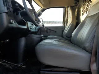 2023 GMC Savana Cargo Van with VIN 1GTW7BFP5P1106258, listed as a Copart auction lot 84307974 with 34,638 mi miles and Non Repairable. Bid and sale history available at carsss.com. Image 7.
