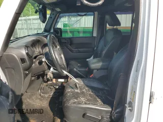 2014 Jeep Wrangler Unlimited Sahara с VIN 1C4BJWEG1EL322781, выставлен на аукционе Copart как лот 64200145 с пробегом 119 500 миль миль и Чистый • Clean title. История ставок и продаж доступна на DreamBid. Изображение 7.