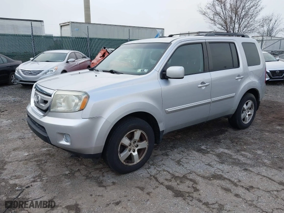 2011 Honda Pilot EX with VIN 5FNYF4H44BB075207, listed as a IAAI auction lot 41823313 with 209,654 mi miles. Bid and sale history available at carsss.com. Image 22.