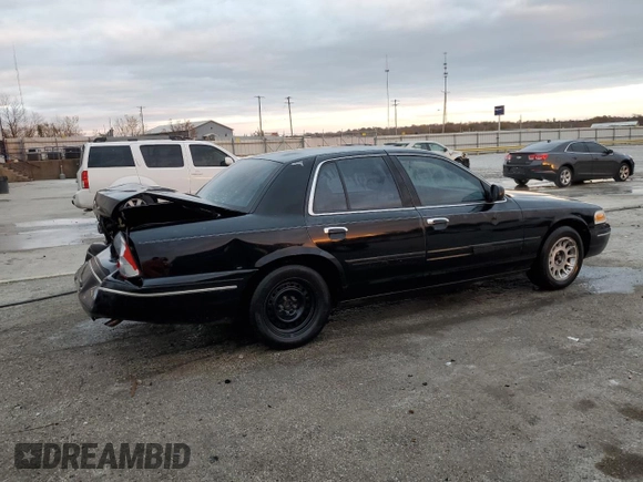 2000 Ford Crown Victoria LX z VIN 2FAFP74W3YX122481, wystawiony jako Copart lot #79189794 z przebiegiem 277 772 mil mil oraz Nie do naprawy • Non repairable. Historia ofert i sprzedaży dostępna na DreamBid. Obrazek 3.