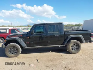 2022 Jeep Gladiator Mojave with VIN 1C6JJTEG7NL180485, listed as a IAAI auction lot 41030779 with 41,445 mi miles and . Bid and sale history available at DreamBid. Image 14.