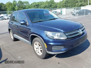 2012 Volkswagen Tiguan SE with VIN WVGAV7AX2CW582223, listed as a IAAI auction lot 42681171 with 129,117 mi miles and . Bid and sale history available at DreamBid. Image 1.