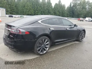 2017 Tesla Model S 100D с VIN 5YJSA1E21HF188840, выставлен на аукционе Copart как лот 62683685 с пробегом 90 101 миль миль и Списание • Salvage title. История ставок и продаж доступна на DreamBid. Изображение 3.