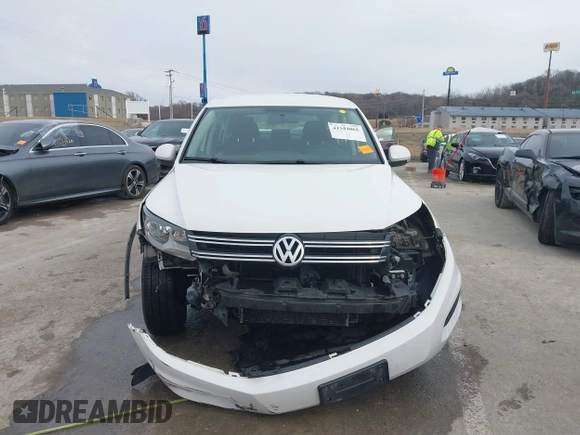 2013 Volkswagen Tiguan S z VIN WVGAV3AX6DW610678, wystawiony jako IAAI lot #41544865 z przebiegiem 102 948 mil mil oraz . Historia ofert i sprzedaży dostępna na DreamBid. Obrazek 12.