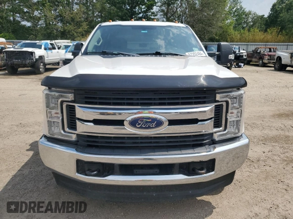 2019 Ford F-350 with VIN 1FD8W3BT8KEF59372, listed as a Copart auction lot 57202484 with 216,006 mi miles and Salvage title. Bid and sale history available at DreamBid. Image 5.