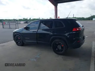 2015 Jeep Cherokee Sport with VIN 1C4PJLAB2FW539397, listed as a IAAI auction lot 42156576 with 120,409 mi miles. Bid and sale history available at carsss.com. Image 14.