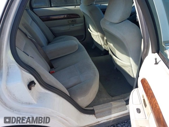 2004 Mercury Grand Marquis GS z VIN 2MEFM74W74X654151, wystawiony jako IAAI lot #42185493 z przebiegiem 203 017 mil mil oraz . Historia ofert i sprzedaży dostępna na DreamBid. Obrazek 8.