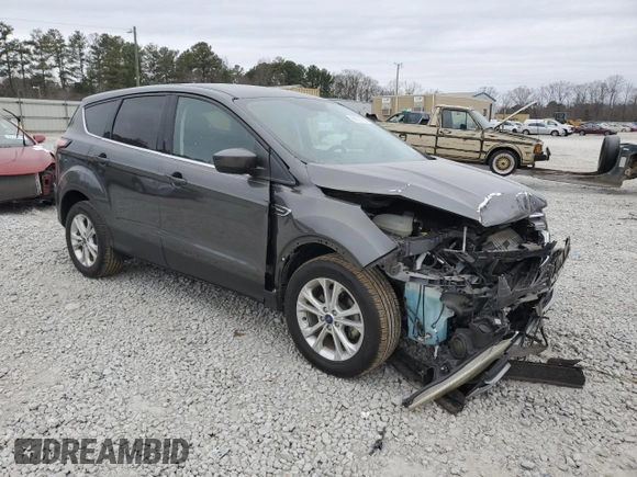 2017 Ford Escape SE with VIN 1FMCU0GD5HUC67421, listed as a Copart auction lot 86633734 with 82,929 mi miles and Salvage Title. Bid and sale history available at DreamBid. Image 4.