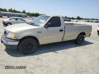 2000 Ford F-150 XL with VIN 1FTZF172XYNB65958, listed as a Copart auction lot 59946145 with 208,988 mi miles and Salvage title. Bid and sale history available at DreamBid. Image 1.