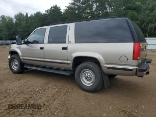 1999 Chevrolet Suburban with VIN 1GNGK26J0XJ439859, listed as a Copart auction lot 69076004 with 277,201 mi miles and Salvage Title. Bid and sale history available at carsss.com. Image 2.
