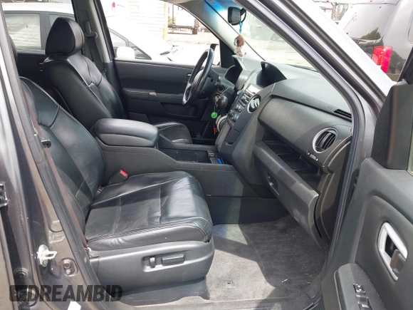 2012 Honda Pilot EX-L with VIN 5FNYF4H52CB081078, listed as a IAAI auction lot 42340966 with 223,319 mi miles and . Bid and sale history available at DreamBid. Image 5.