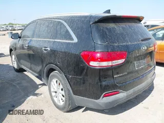 2017 Kia Sorento LX with VIN 5XYPG4A30HG242934, listed as a IAAI auction lot 41856236 with 164,664 mi miles. Bid and sale history available at carsss.com. Image 3.