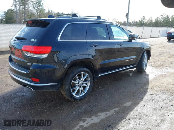 2015 Jeep Grand Cherokee Summit with VIN 1C4RJFJMXFC878812, listed as a IAAI auction lot 41637279 with 149,488 mi miles. Bid and sale history available at carsss.com. Image 4.