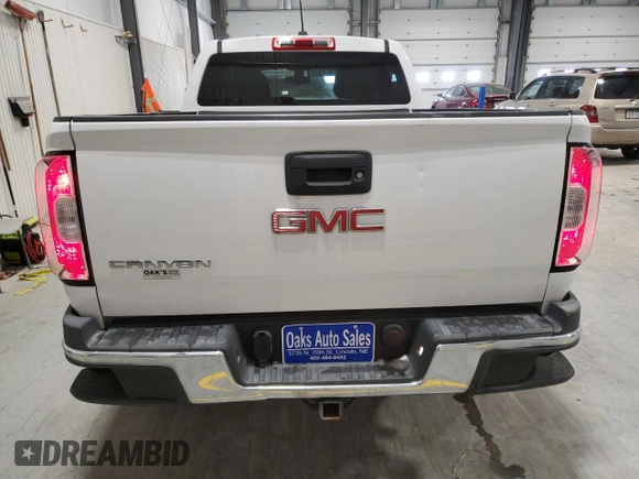 2015 GMC Canyon 2WD with VIN 1GTG5AE35F1172598, listed as a Copart auction lot 41620115 with 135,864 mi miles and Salvage Title. Bid and sale history available at DreamBid. Image 6.