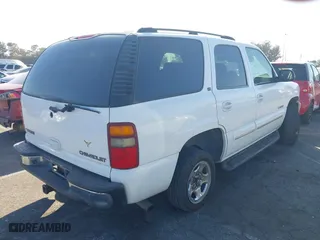2003 Chevrolet Tahoe LT with VIN 1GNEC13Z73R168819, listed as a IAAI auction lot 41679179 with 141,164 mi miles. Bid and sale history available at carsss.com. Image 4.