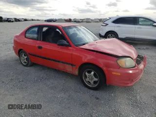 2003 Hyundai Accent with VIN KMHCF35C33U255489, listed as a Copart auction lot 75490604 with 219,457 mi miles and Salvage Title. Bid and sale history available at carsss.com. Image 4.