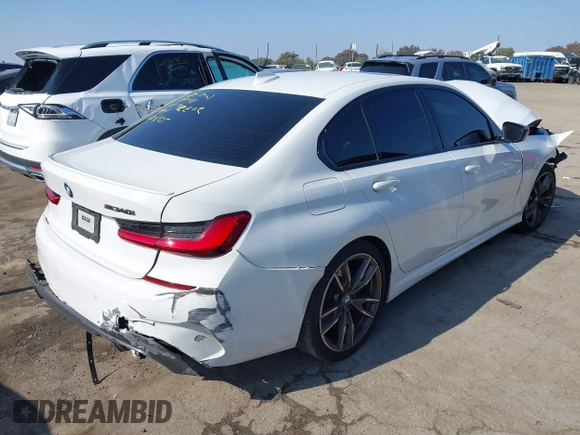 2020 BMW 3 Series M340i with VIN 3MW5U7J03L8B43176, listed as a IAAI auction lot 41450902 with 61,118 mi miles. Bid and sale history available at carsss.com. Image 4.
