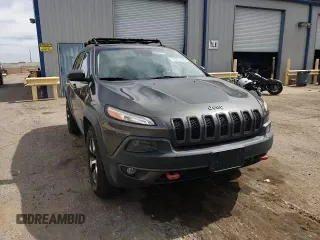 2014 Jeep Cherokee Trailhawk with VIN 1C4PJMBS6EW140981, listed as a Copart auction lot 58260325 with 97,036 mi miles and Salvage title. Bid and sale history available at DreamBid. Image 14.