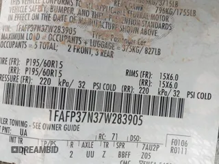 2007 Ford Focus S with VIN 1FAFP37N37W283905, listed as a IAAI auction lot 39363810 with 96,684 mi miles and . Bid and sale history available at carsss.com. Image 9.