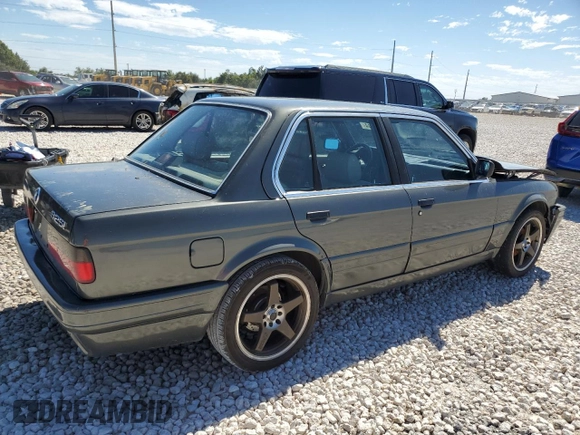 1987 BMW 3 Series 325i with VIN WBAAD2309H2446547, listed as a Copart auction lot 70882344 with 187,806 mi miles and Salvage Title. Bid and sale history available at carsss.com. Image 3.