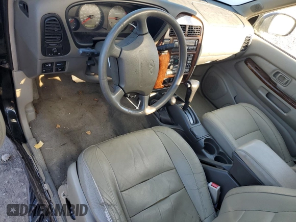 1998 Infiniti QX4 with VIN JNRAR05YXWW025938, listed as a Copart auction lot 49781395 with 111,967 mi miles and Salvage Title. Bid and sale history available at DreamBid. Image 8.