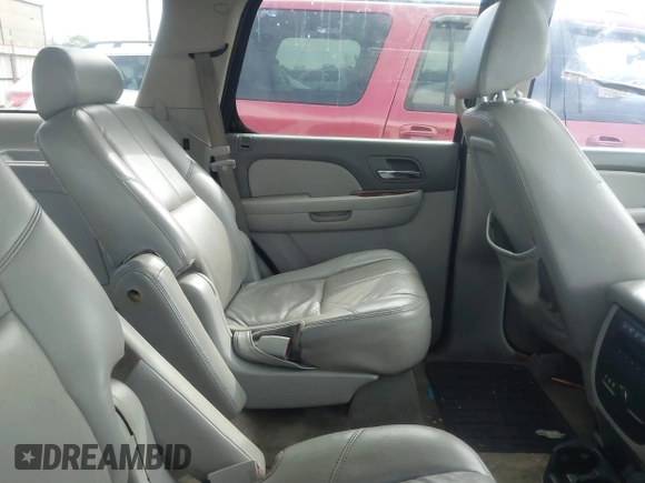 2008 Chevrolet Tahoe LTZ with VIN 1GNFC13JX8R277832, listed as a IAAI auction lot 41348121 with 210,576 mi miles and . Bid and sale history available at DreamBid. Image 8.