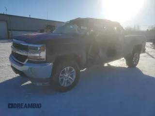 2016 Chevrolet Silverado 1500 LT with VIN 1GCVKREC2GZ267704, listed as a Copart auction lot 42228345 with 94,945 mi miles and Salvage Title. Bid and sale history available at carsss.com. Image 1.