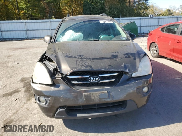 2009 Kia Rondo LX Base with VIN KNAFG528497260778, listed as a Copart auction lot 76497534 with 276,585 mi miles and Salvage Title. Bid and sale history available at carsss.com. Image 5.