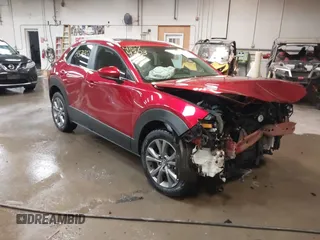 2024 Mazda CX-30 S Preferred with VIN 3MVDMBCM7RM685929, listed as a IAAI auction lot 41574303 with 7,928 mi miles and . Bid and sale history available at DreamBid. Image 1.