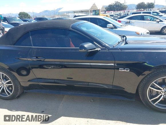 2015 Ford Mustang GT Premium z VIN 1FATP8FFXF5413662, wystawiony jako IAAI lot #41921692 z przebiegiem 62 667 mil mil oraz . Historia ofert i sprzedaży dostępna na DreamBid. Obrazek 14.