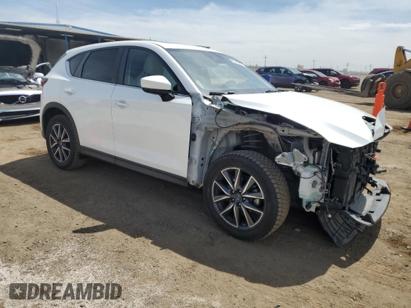 2018 Mazda CX-5 Touring with VIN JM3KFBCM0J0431285, listed as a Copart auction lot 53919695 with 61,745 mi miles and Salvage Title. Bid and sale history available at carsss.com. Image 4.