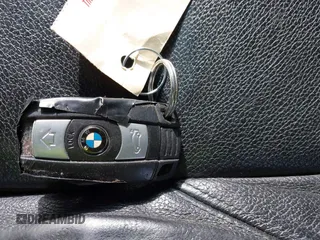 2011 BMW X5 35i z VIN 5UXZV4C52BL739488, wystawiony jako IAAI lot #41199011 z przebiegiem 193 403 mil mil oraz . Historia ofert i sprzedaży dostępna na DreamBid. Obrazek 11.