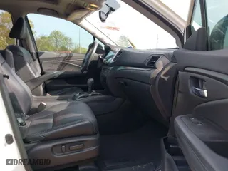 2017 Honda Pilot EX-L with VIN 5FNYF5H58HB044131, listed as a IAAI auction lot 41843395 with 122,311 mi miles. Bid and sale history available at carsss.com. Image 5.