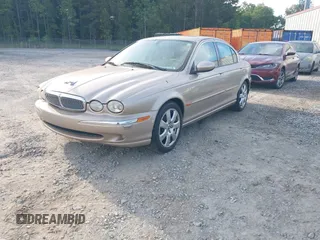 2004 Jaguar X-Type z VIN SAJEA51C84WD82052, wystawiony jako IAAI lot #42240141 z przebiegiem 50 631 mil mil oraz . Historia ofert i sprzedaży dostępna na DreamBid. Obrazek 2.