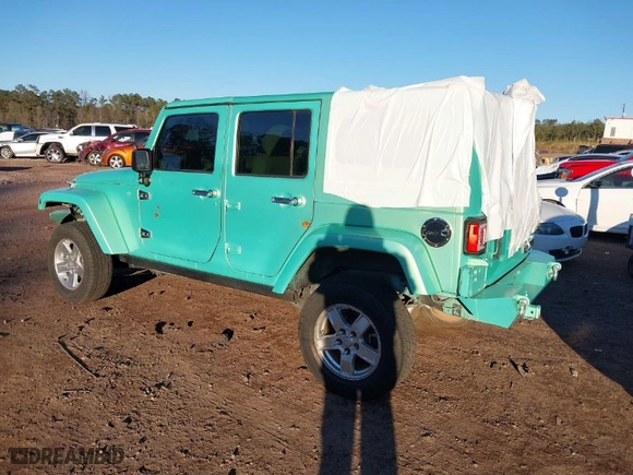 2010 Jeep Wrangler Unlimited Sport with VIN 1J4BA3H15AL166397, listed as a IAAI auction lot 41391376 with 87,091 mi miles. Bid and sale history available at carsss.com. Image 3.