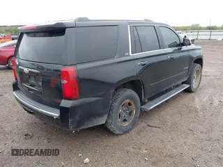 2016 Chevrolet Tahoe LTZ with VIN 1GNSKCKC7GR171904, listed as a IAAI auction lot 41967060 with 223,334 mi miles and . Bid and sale history available at DreamBid. Image 4.