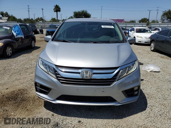 2019 Honda Odyssey EX with VIN 5FNRL6H59KB011858, listed as a Copart auction lot 60272445 with 54,708 mi miles and Salvage title. Bid and sale history available at DreamBid. Image 5.